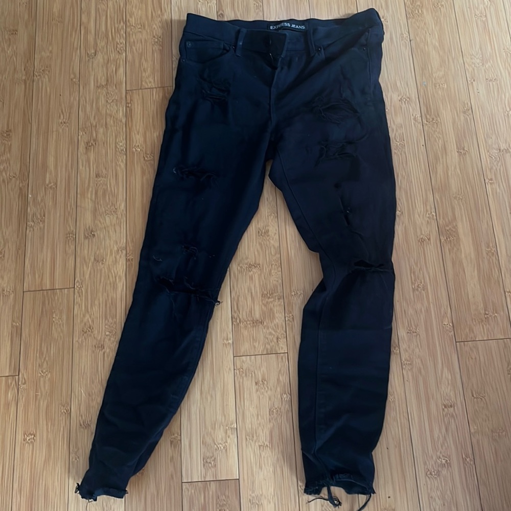 Like new black jeans with rips. Tight. Size 6 women
